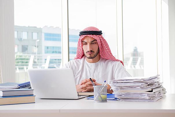 Office administrator working with business records